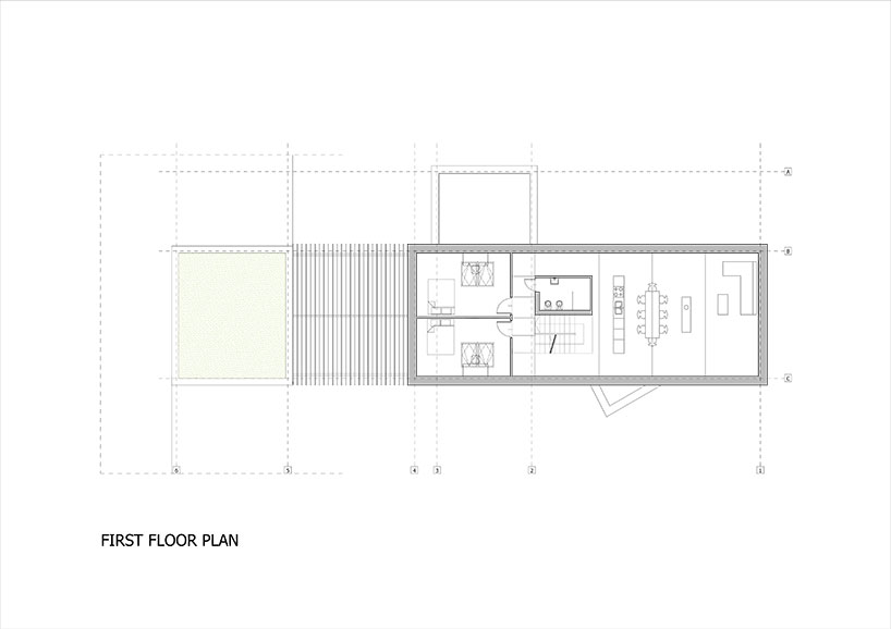 kropka studio projects a house in the landscape of stone and wood