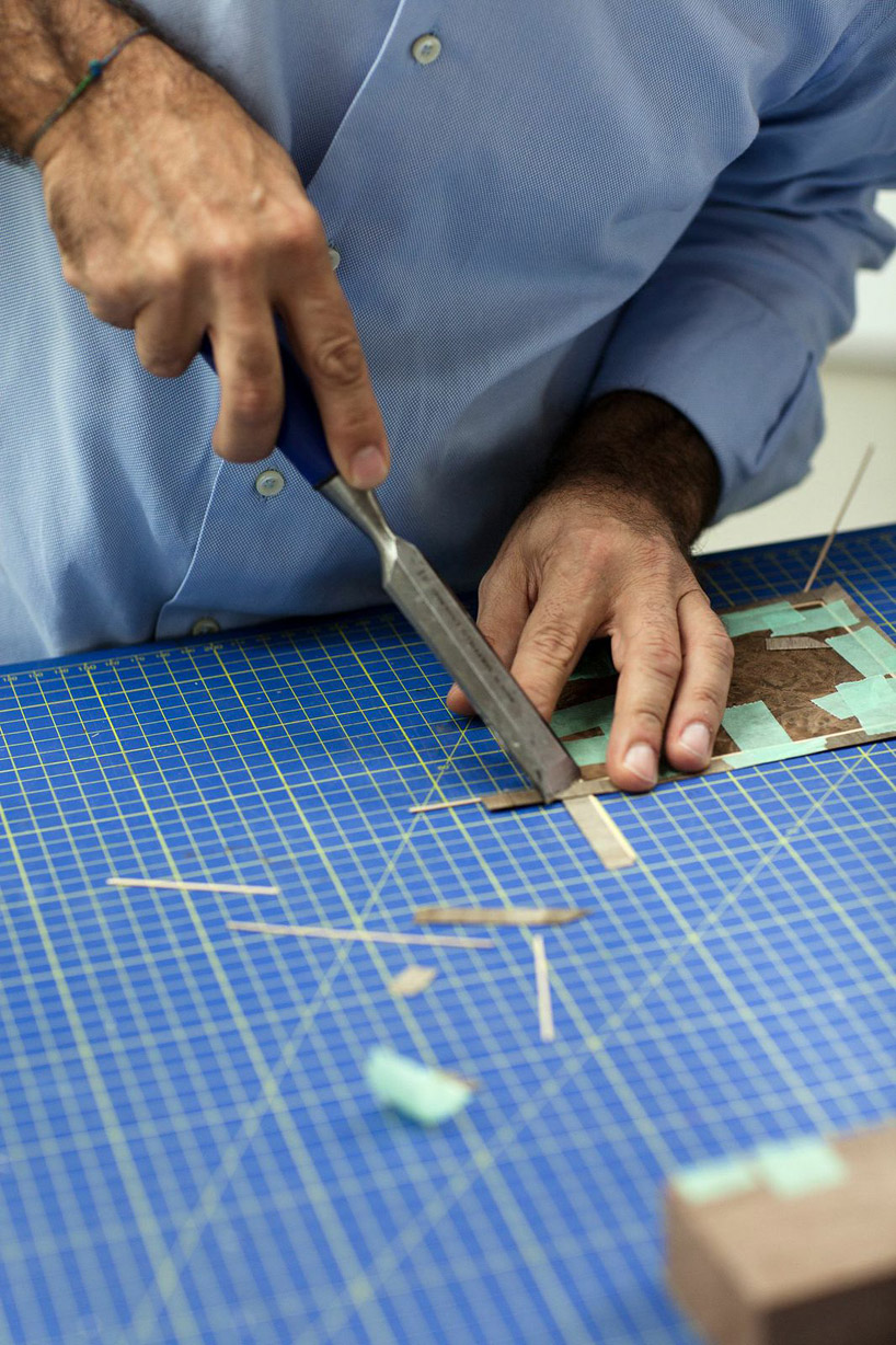 massimo uberti sculpts with neon light for bentley elements