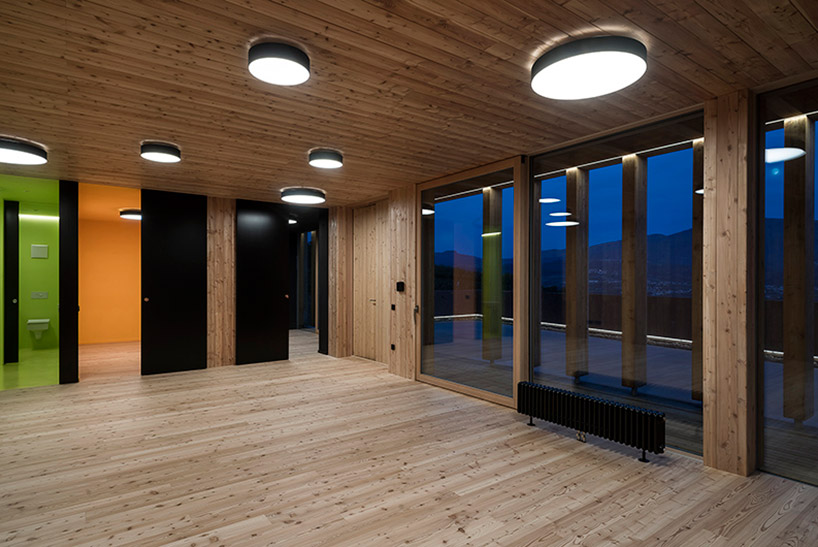mirko franzoso architetto casa sociale caltron social house cles trentino italy designboom