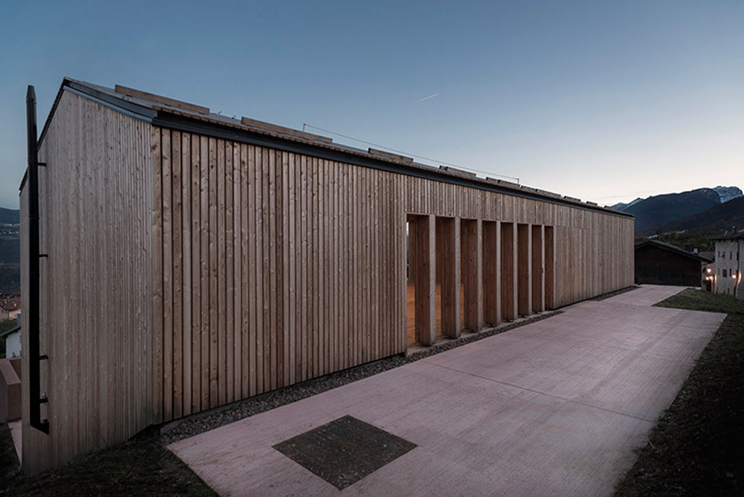 mirko franzoso architetto casa sociale caltron social house cles trentino italy designboom
