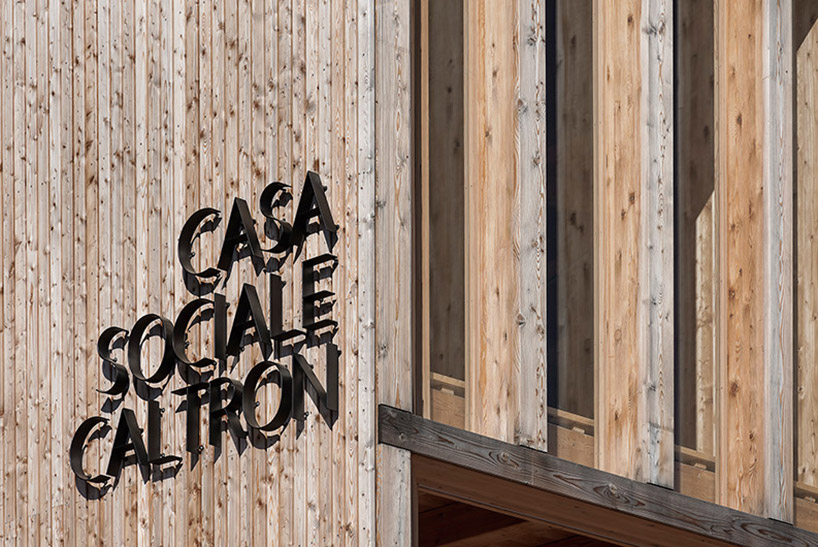 mirko franzoso architetto casa sociale caltron social house cles trentino italy designboom