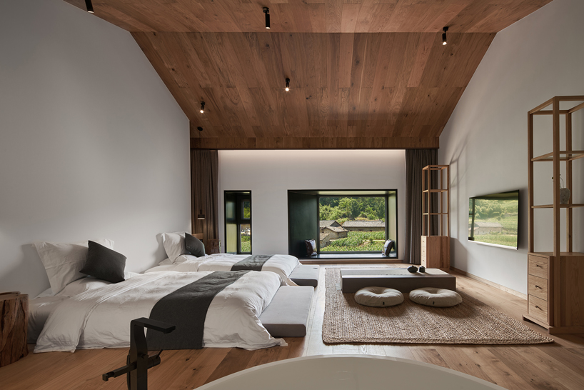 nanchawan·shiwu tribe homestay nestles into a mountain village in china