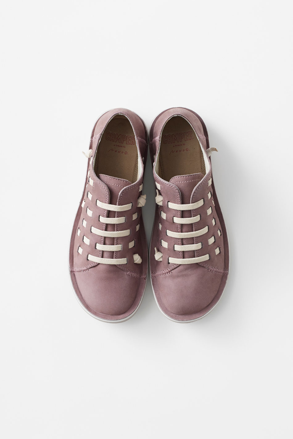 tribute by nendo reinterprets the camper beetle shoe with bold elastic ...