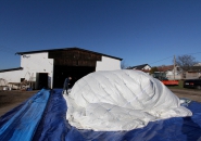 numen/for use installs inhabitable string sculpture inside inflatable bubble