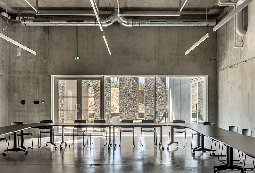 randja-architecture-robust-stone-concrete-technology-center-france-designboom-05