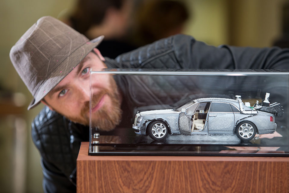 artists re-visualize the rolls-royce ghost with scale models for charity