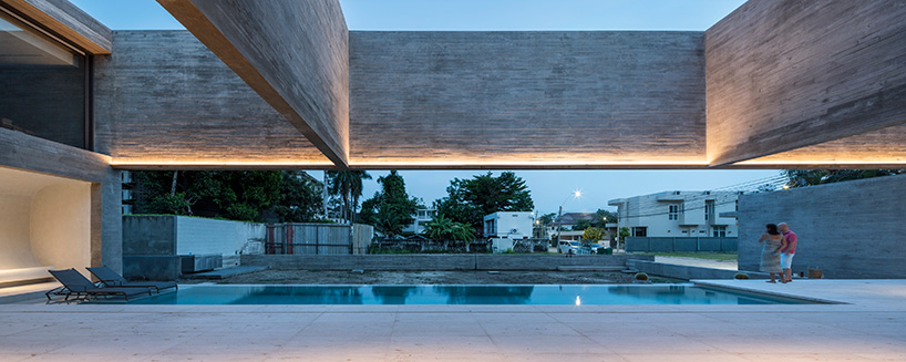intersecting-concrete-slabs-stu-d-o-architects-monolithic-residence-thailand-designboom-2