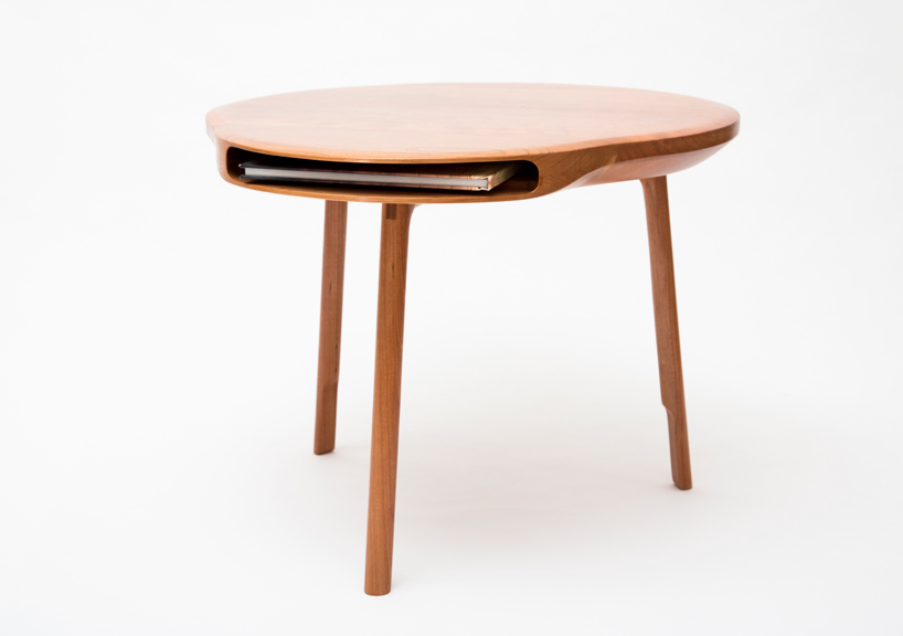 tokyo table by loic bard features discreet storage compartment