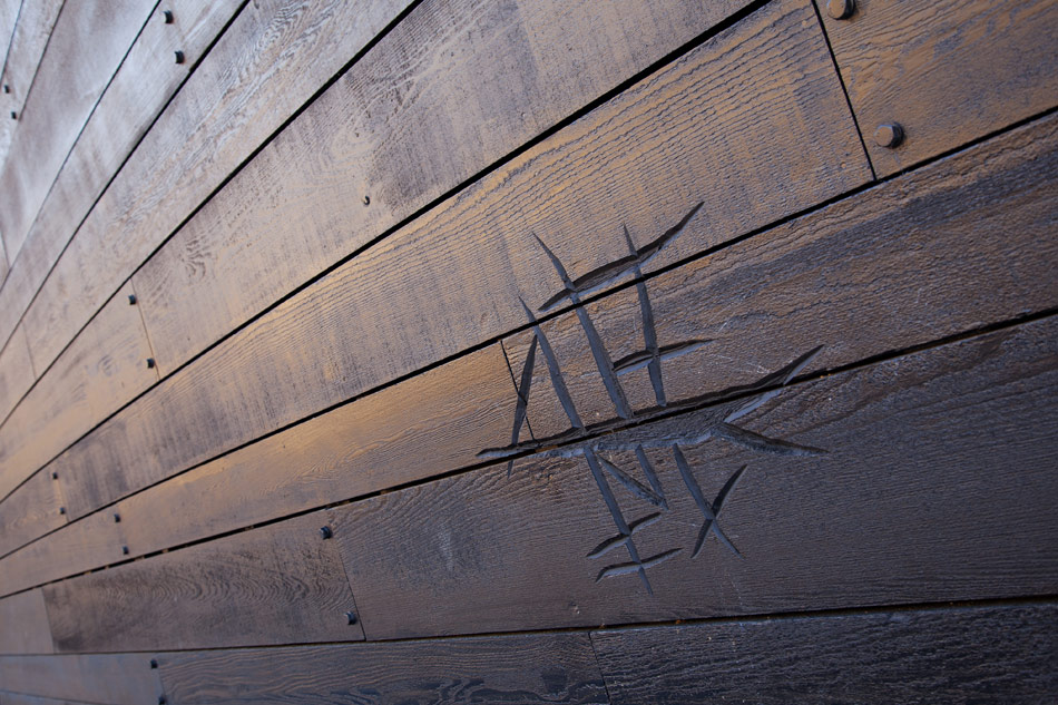 wilkinson eyre architects\' mary rose museum evokes shape of ship hull
