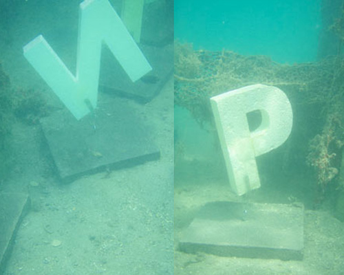 underwater alphabet and rocket tree by michael sailstorfer