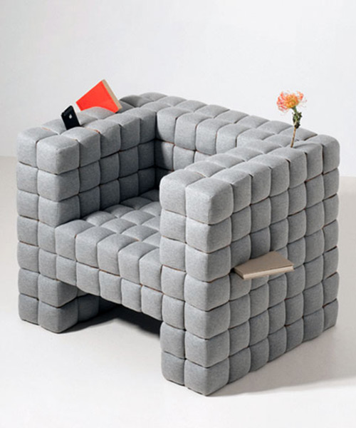 daisuke motogi make the cracks between seat cushions purposeful with 'lost in sofa'