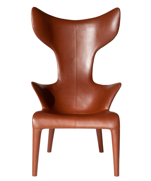 philippe starck's 'lou read' chair for driade contains a throne-like quality