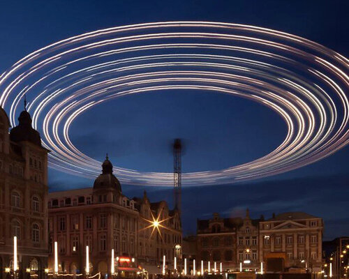 pivoting crane lamp by gijs van vaerenbergh creates 'skylight' in belgium