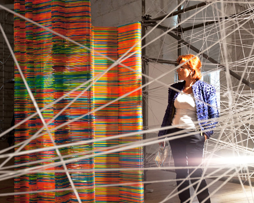 LIKEarchitects form chromatic screen installation with IKEA hangers