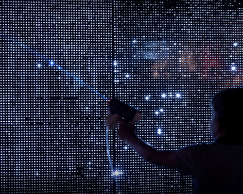 interactive water light graffiti wall installation by antonin fourneau