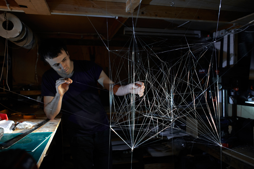 paul cocksedge's auditorium mimics a spider web
