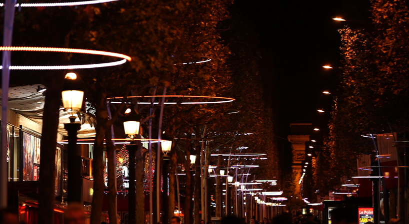 tree rings by ACT lighting design illuminate the champs elysée in paris