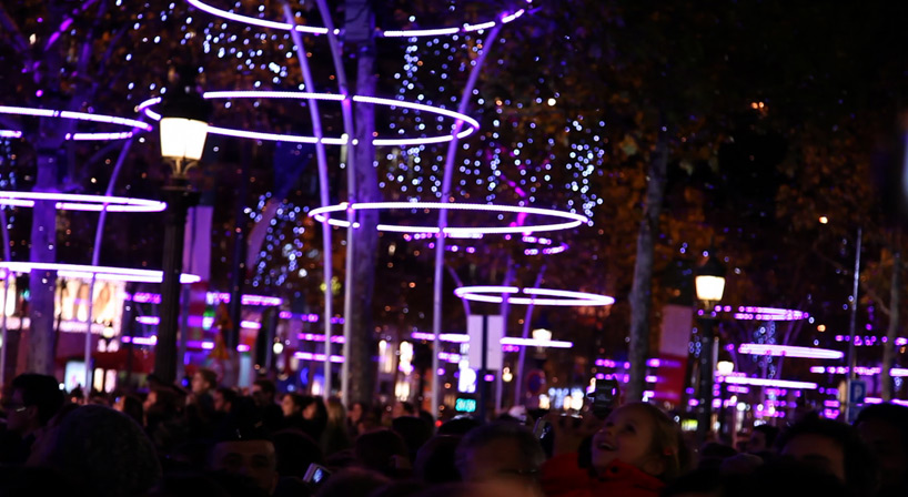 tree rings by ACT lighting design illuminate the champs elysée in paris