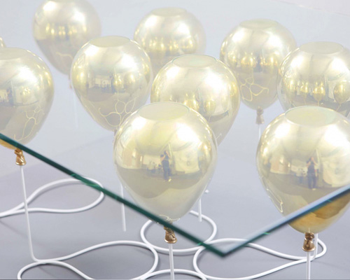 golden balloons support glass tabletop UP by duffy london