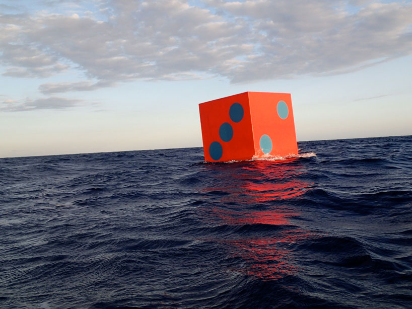 artist max mulhern leaves floating dice to chance