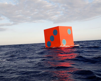 artist max mulhern leaves floating dice to chance