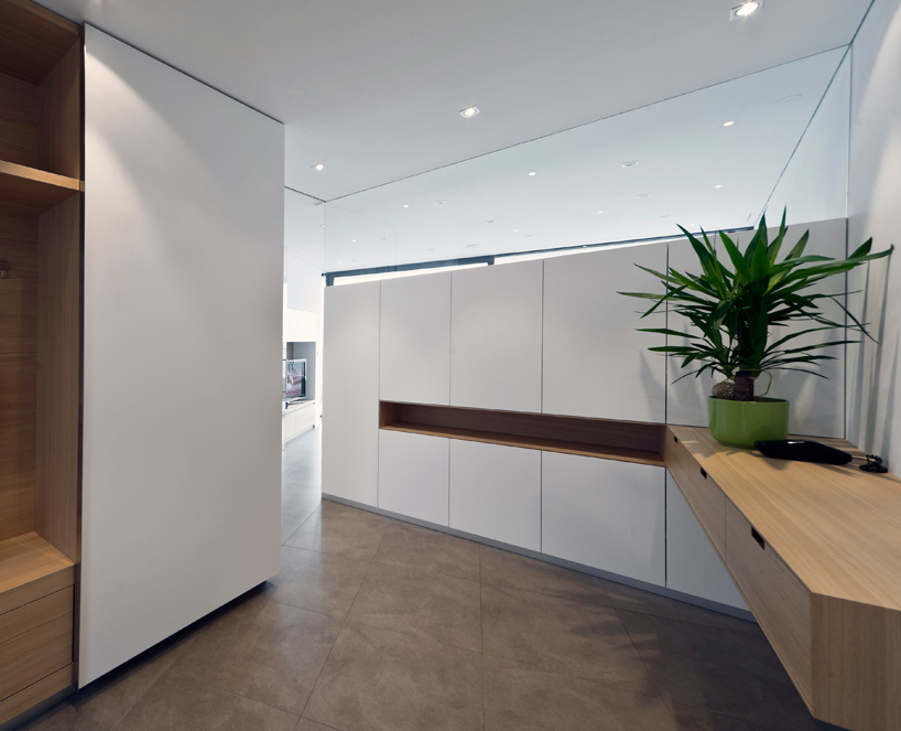 monovolume architecture: two family house giacomuzzi