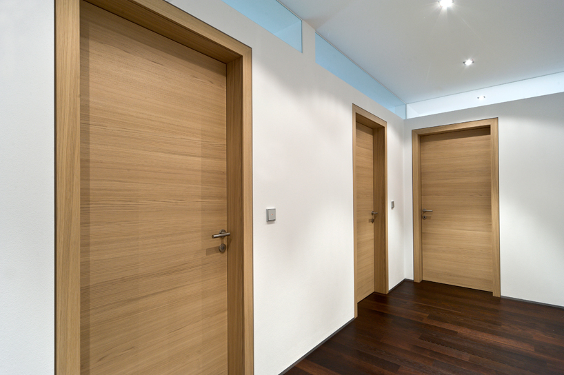 monovolume architecture: two family house giacomuzzi