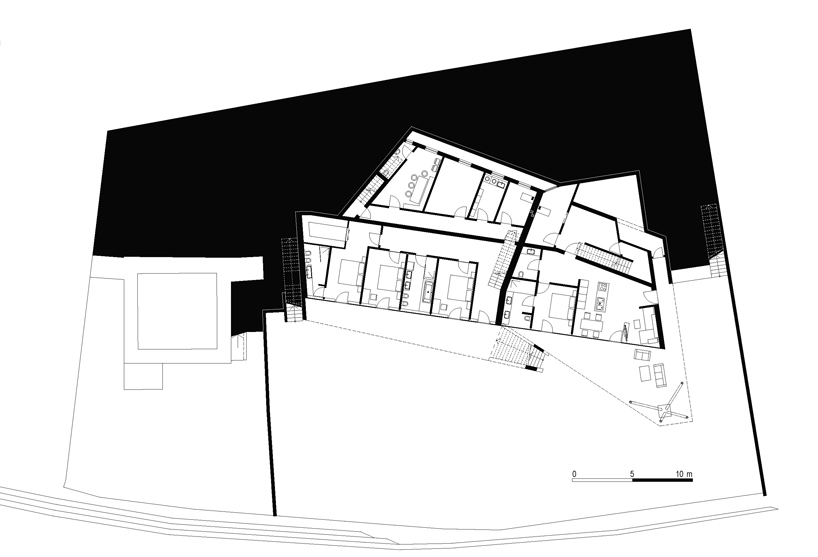 monovolume architecture: two family house giacomuzzi