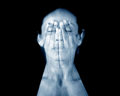 ghostly expressions leak through covered faces by ana de orbegoso