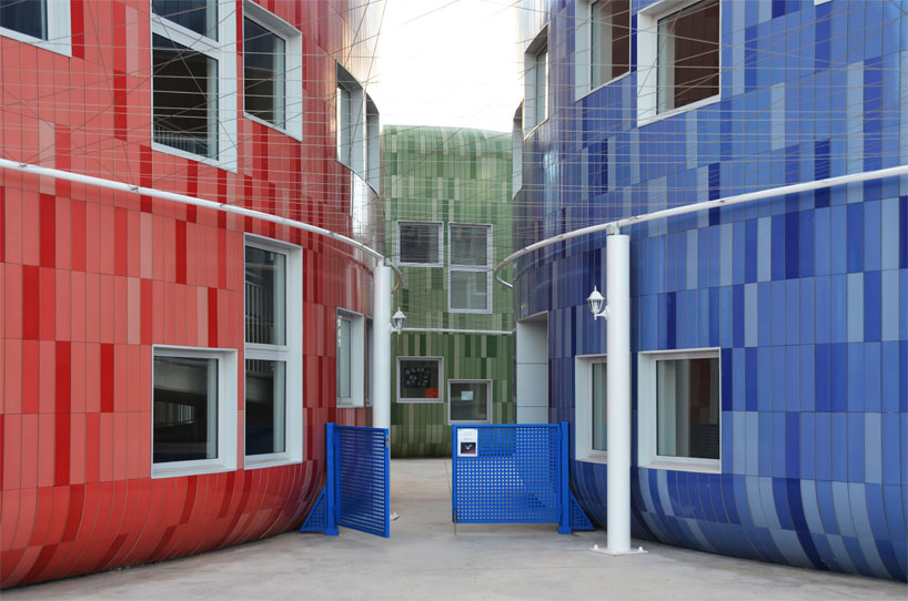 colorful cladding at the innovation center for children children's innovation centre in valencia clad in colorful tiles