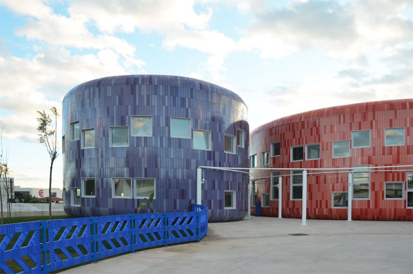 colorful cladding at the innovation center for children children's innovation centre in valencia clad in colorful tiles
