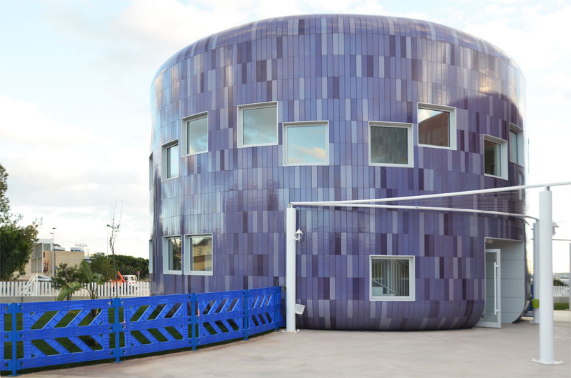 colorful cladding at the innovation center for children children's innovation centre in valencia clad in colorful tiles