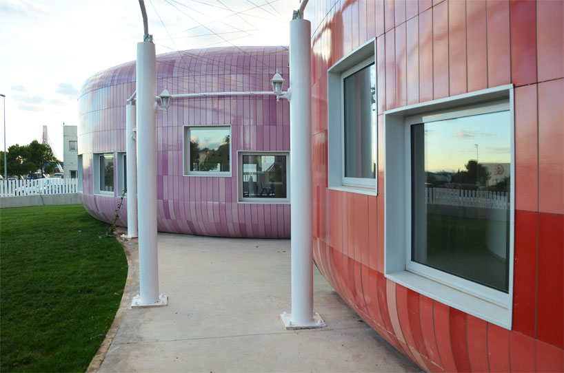 colorful cladding at the innovation center for children children's innovation centre in valencia clad in colorful tiles