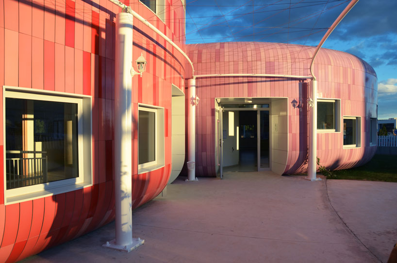 colorful cladding at the innovation center for children children's innovation centre in valencia clad in colorful tiles