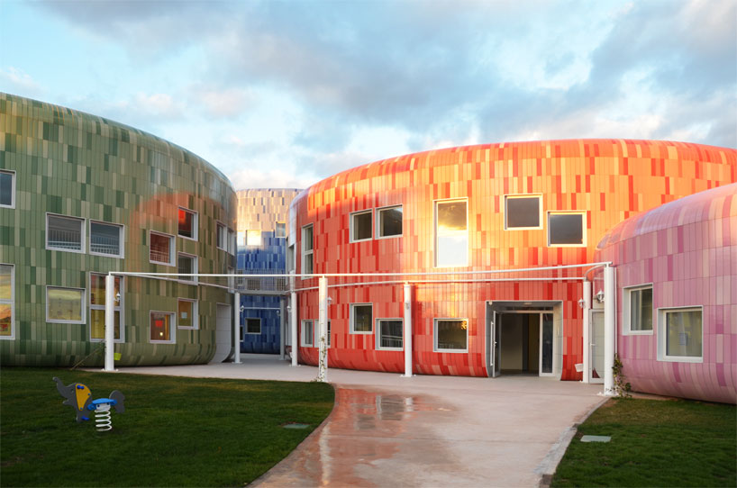 colorful cladding at the innovation center for children children's innovation centre in valencia clad in colorful tiles