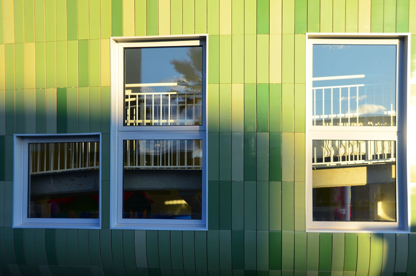 colorful cladding at the innovation center for children children's innovation centre in valencia clad in colorful tiles