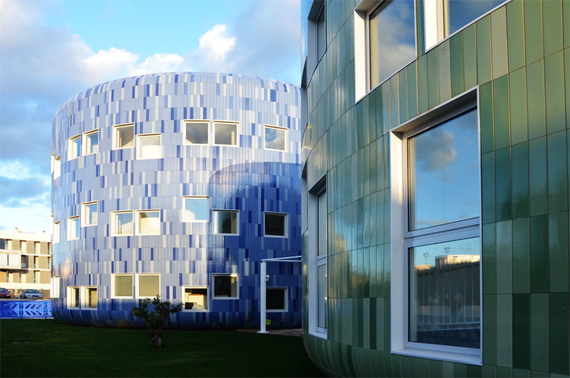 colorful cladding at the innovation center for children children's innovation centre in valencia clad in colorful tiles