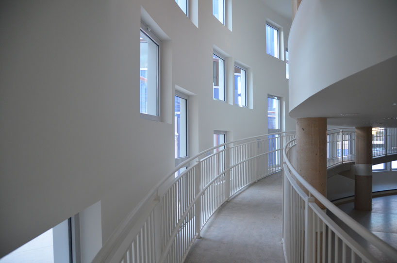 colorful cladding at the innovation center for children children's innovation centre in valencia clad in colorful tiles
