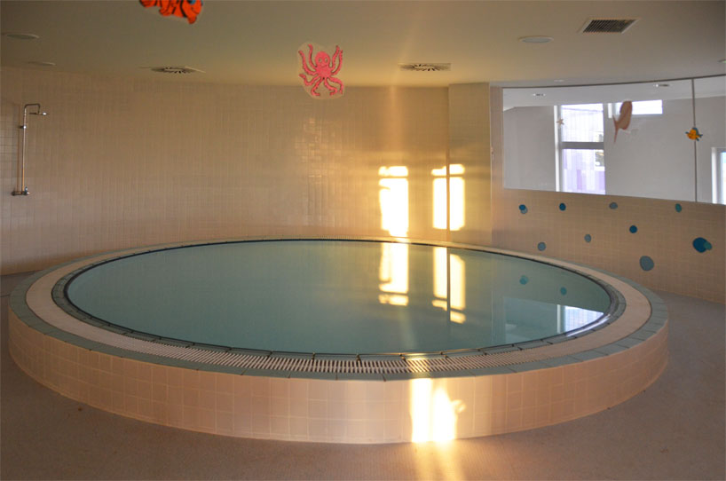 colorful cladding at the innovation center for children children's innovation centre in valencia clad in colorful tiles