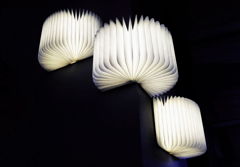 lumio unfolds from a book into a lamp