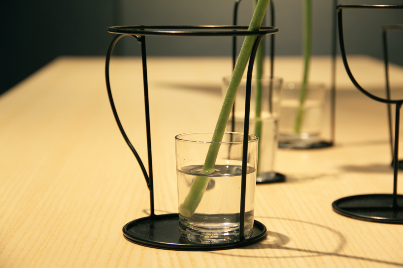 small black vases by nendo for david design at stockholm furniture fair