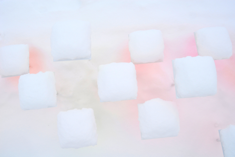 color reflects onto snow in an installation by toshihiko shibuya