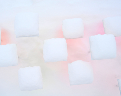 color reflects onto snow in an installation by toshihiko shibuya
