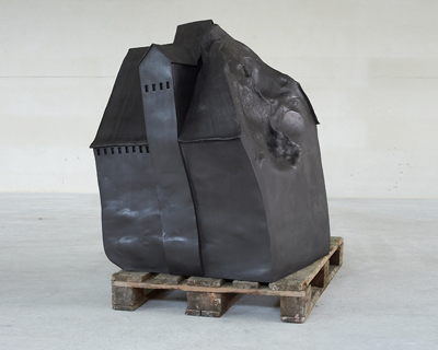 erwin wurm kicks, punches and steps on his architectural clay sculptures