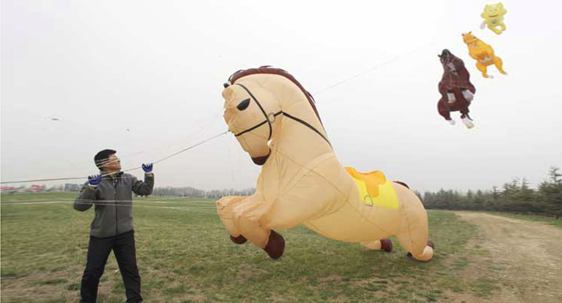 weifang international kite festival: folklore flying high