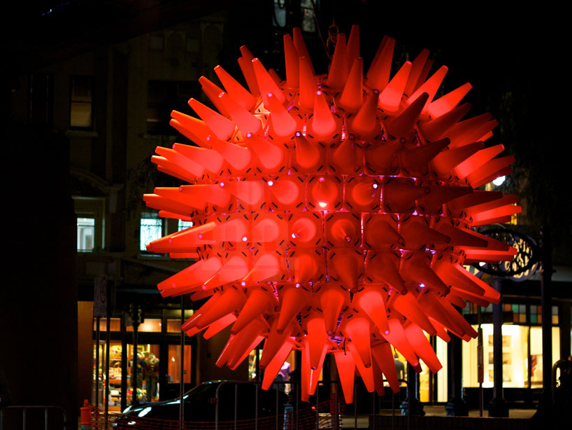 giant glowing orb made from 200 pylons by woods bagot