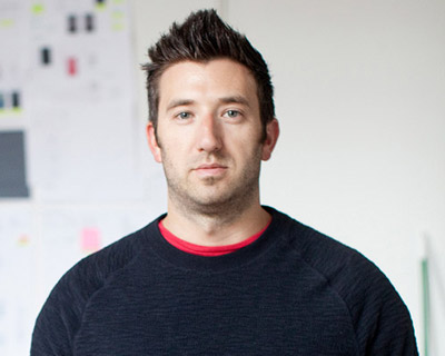 mike kruzeniski twitter design lead at WHAT DESIGN CAN DO! conference