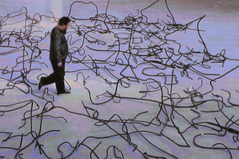 ai weiwei straightens 150 tons of steel rebar from sichuan quake