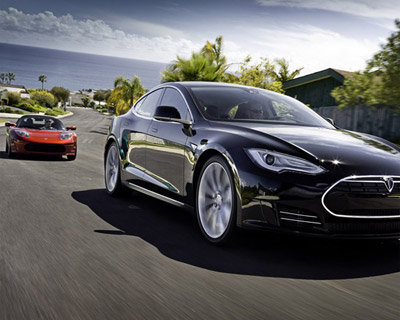 tesla unveils 90 second swap-out battery system