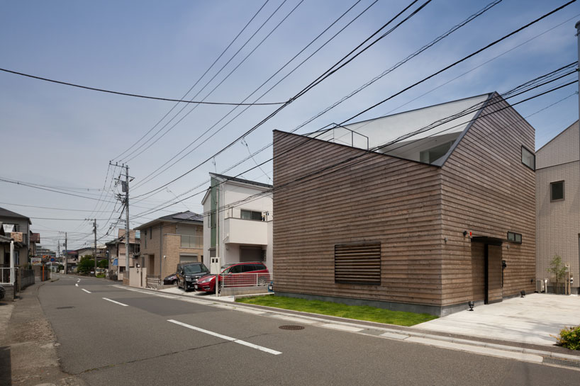 level architects' house in ofuna sports a deeply angled roofline